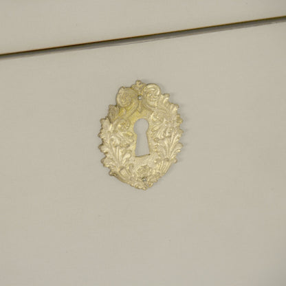 Anjelica Dresser by Zentique in off-white, gold leaf and beech, plywood. Made from beech, plywood in a traditional style.