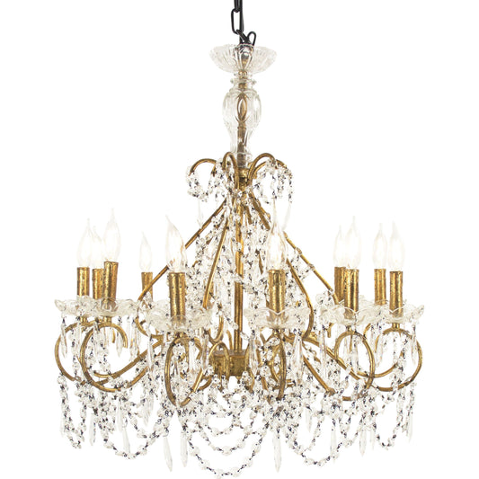 Fauna Chandelier by Zentique in golf leaf and iron. Made from iron in a traditional style.