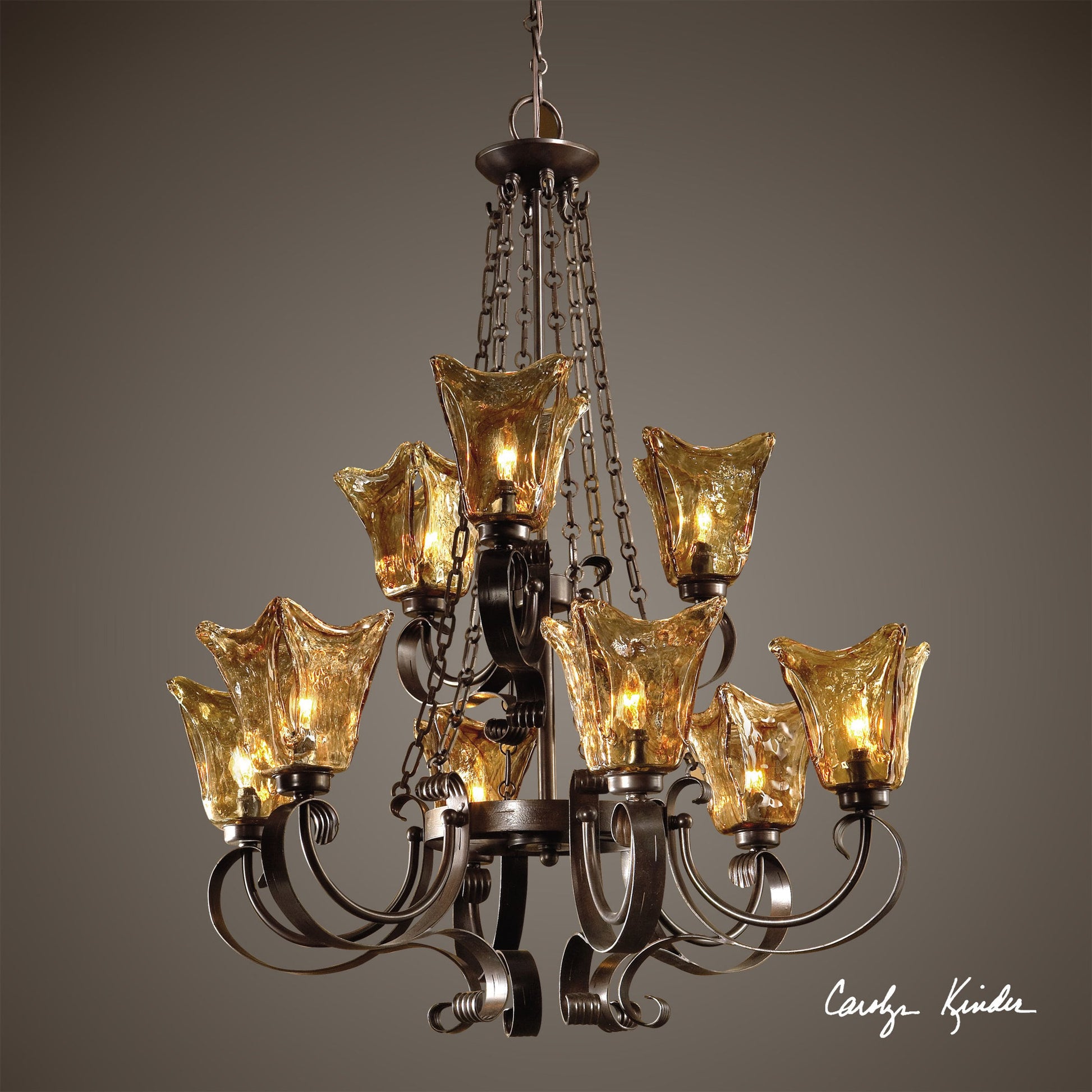 Vetraio Chandelier by Uttermost in bronze. Made from metal, brass, glass in a modern style.