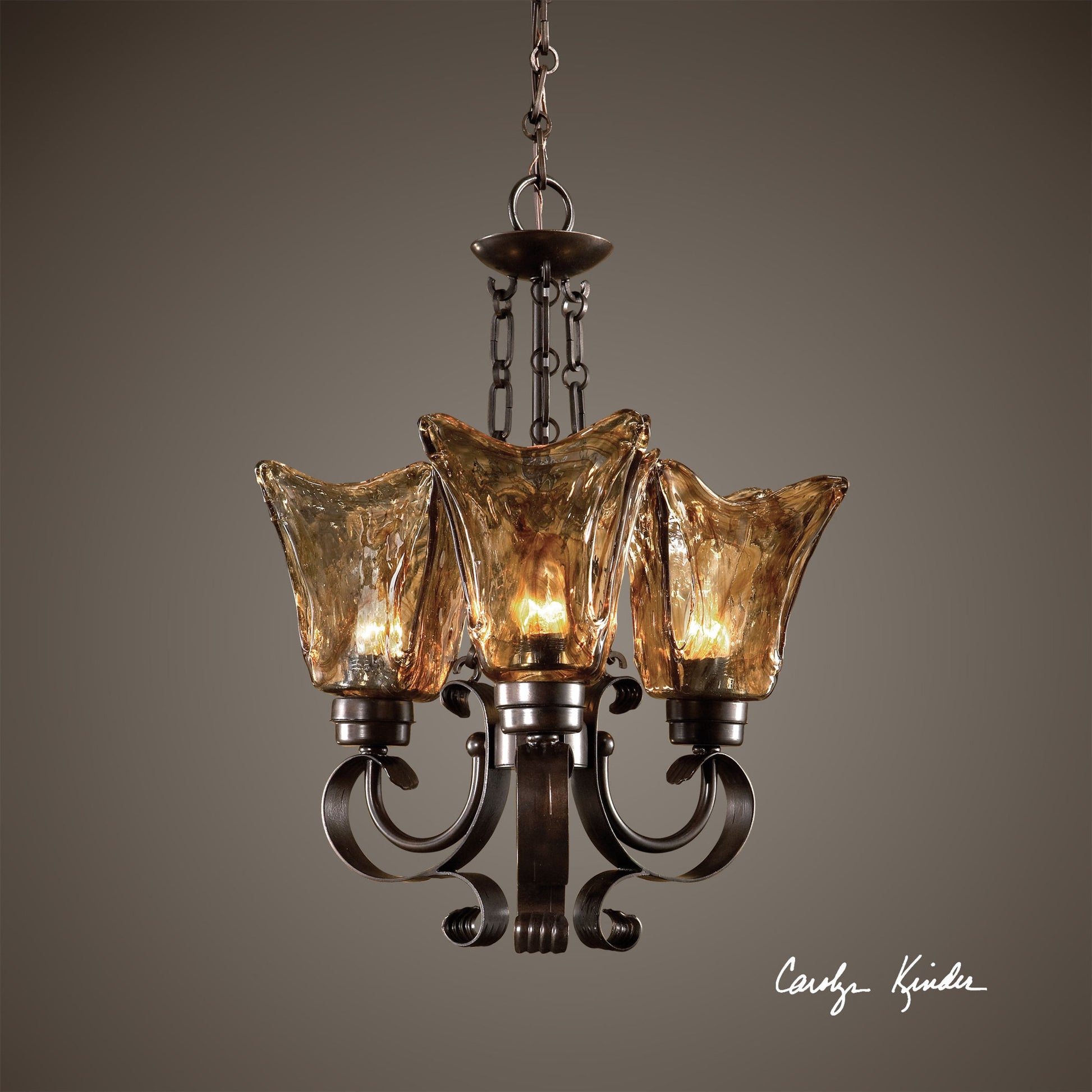 Vetraio Chandelier by Uttermost in bronze. Made from metal, brass, glass in a modern style.