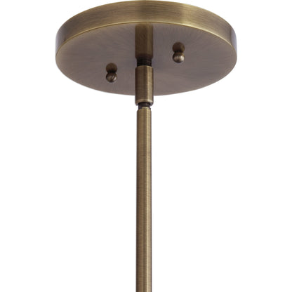 Calix Pendant by Uttermost in aged brass. Made from steel, glass in a transitional style.