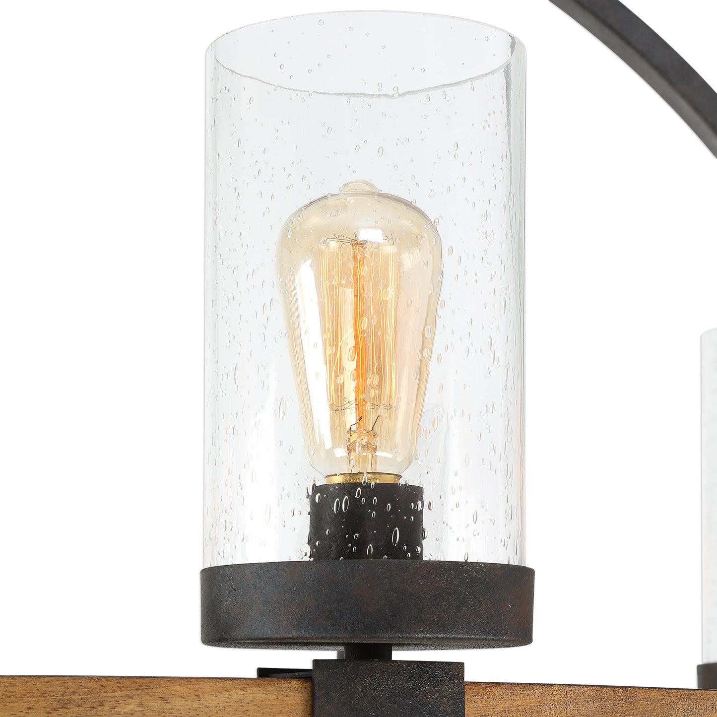 005 S-328924 | Closeup | Atwood Wagon Wheel Pendant by Uttermost. Made from steel, rubber wood, glass in a rustic style.