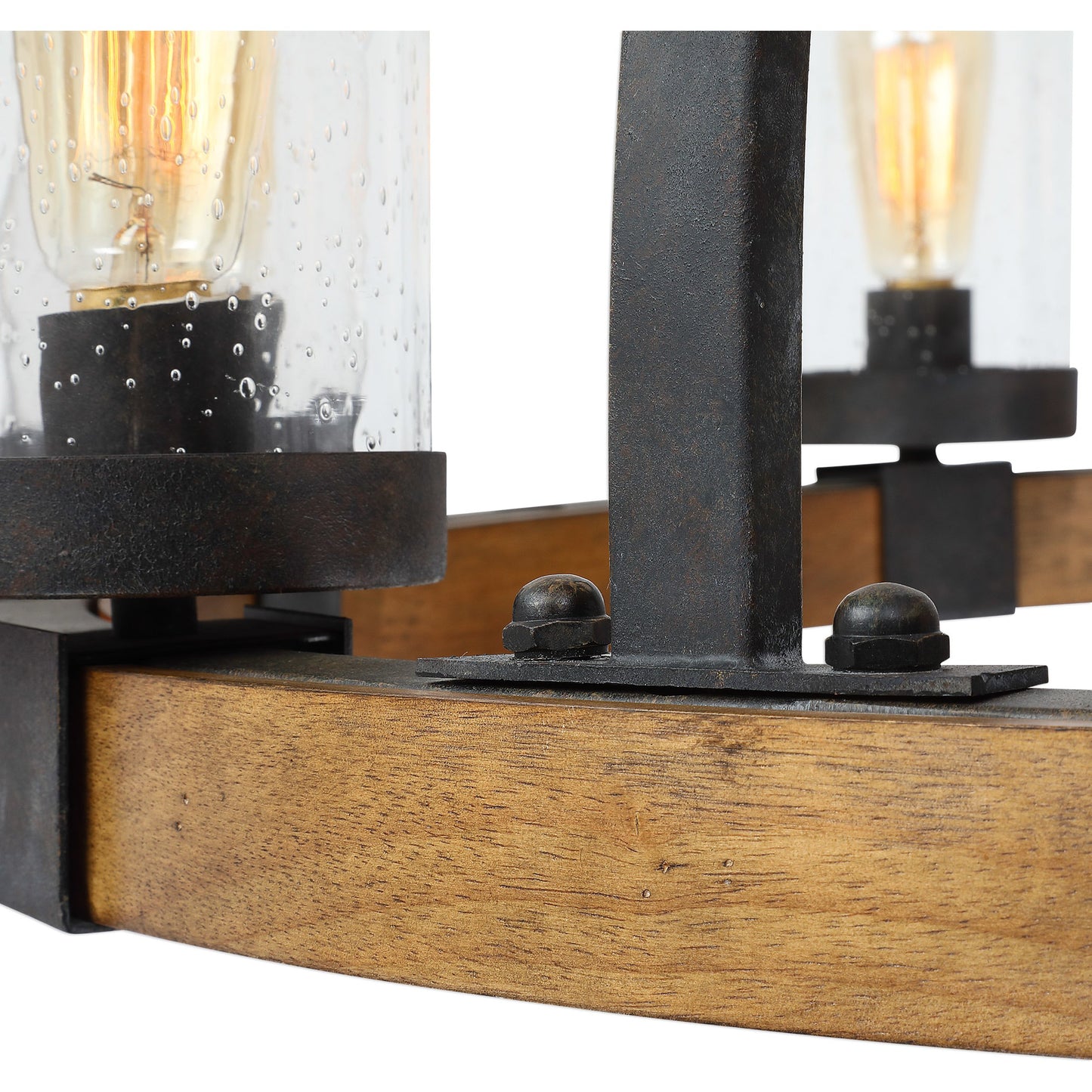 004 S-328924 | Closeup | Atwood Wagon Wheel Pendant by Uttermost. Made from steel, rubber wood, glass in a rustic style.