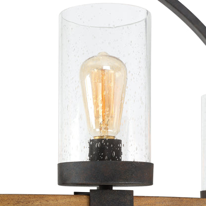 Atwood Wagon Wheel Pendant by Uttermost. Made from steel, rubber wood, glass in a rustic style.