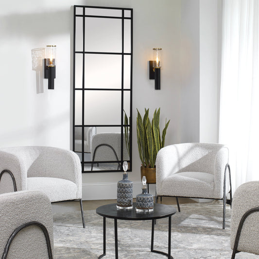 Jarsdel Industrial Sconce by Uttermost. Made from steel, glass in a modern style.