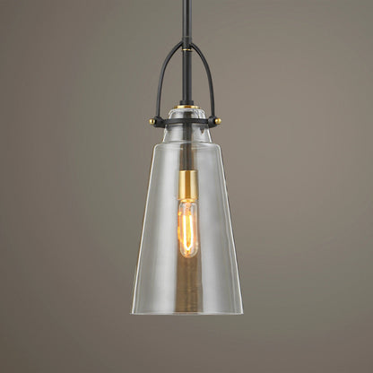 Saugus Pendant by Uttermost in brass. Made from steel, glass in a modern style.