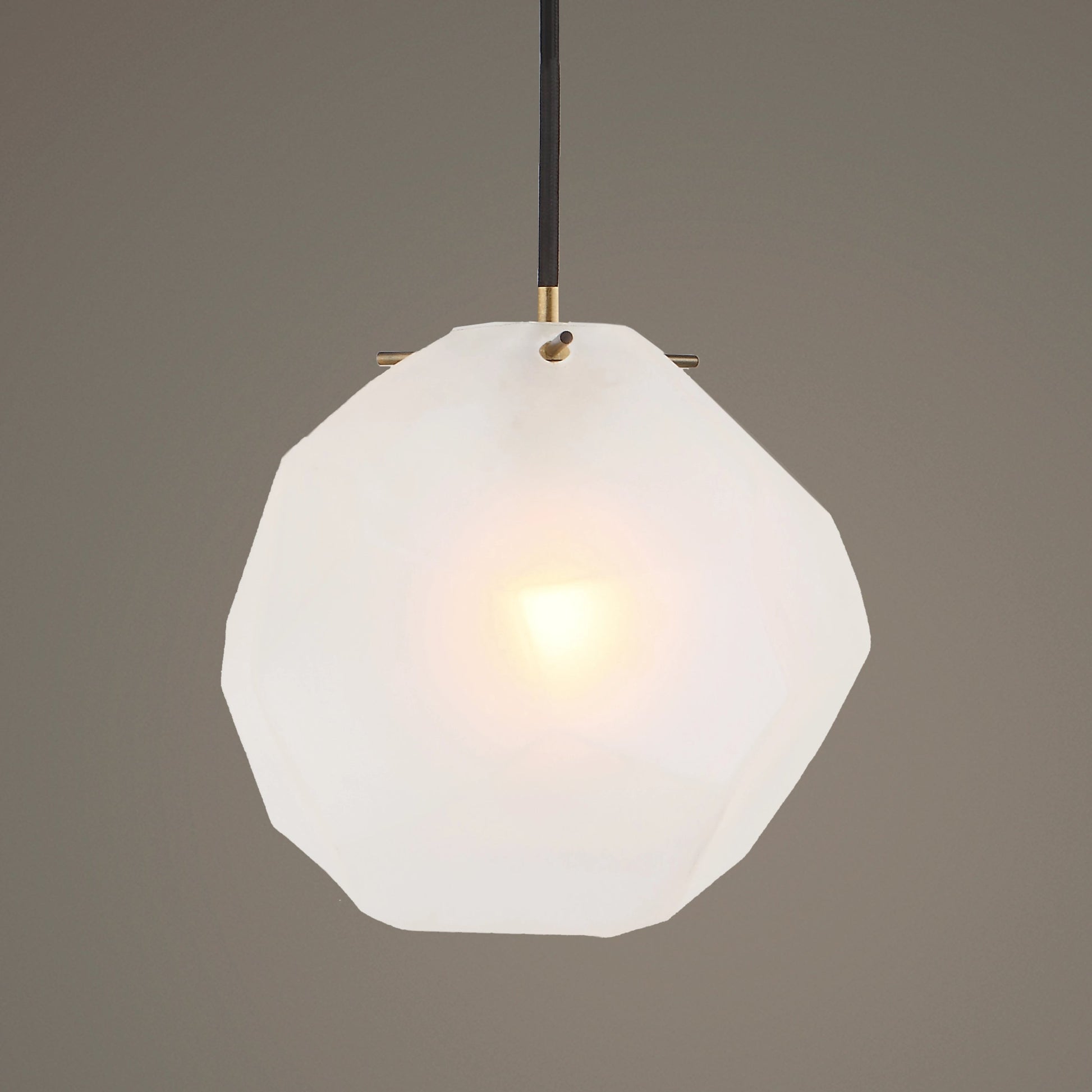 Geodesic 1 Light Mini Pendant by Uttermost in brass. Made from steel, glass in a modern style.
