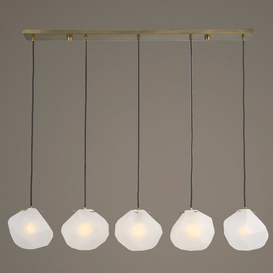 Geodesic 5 Light Linear Pendant by Uttermost in brass. Made from steel, glass in a modern style.