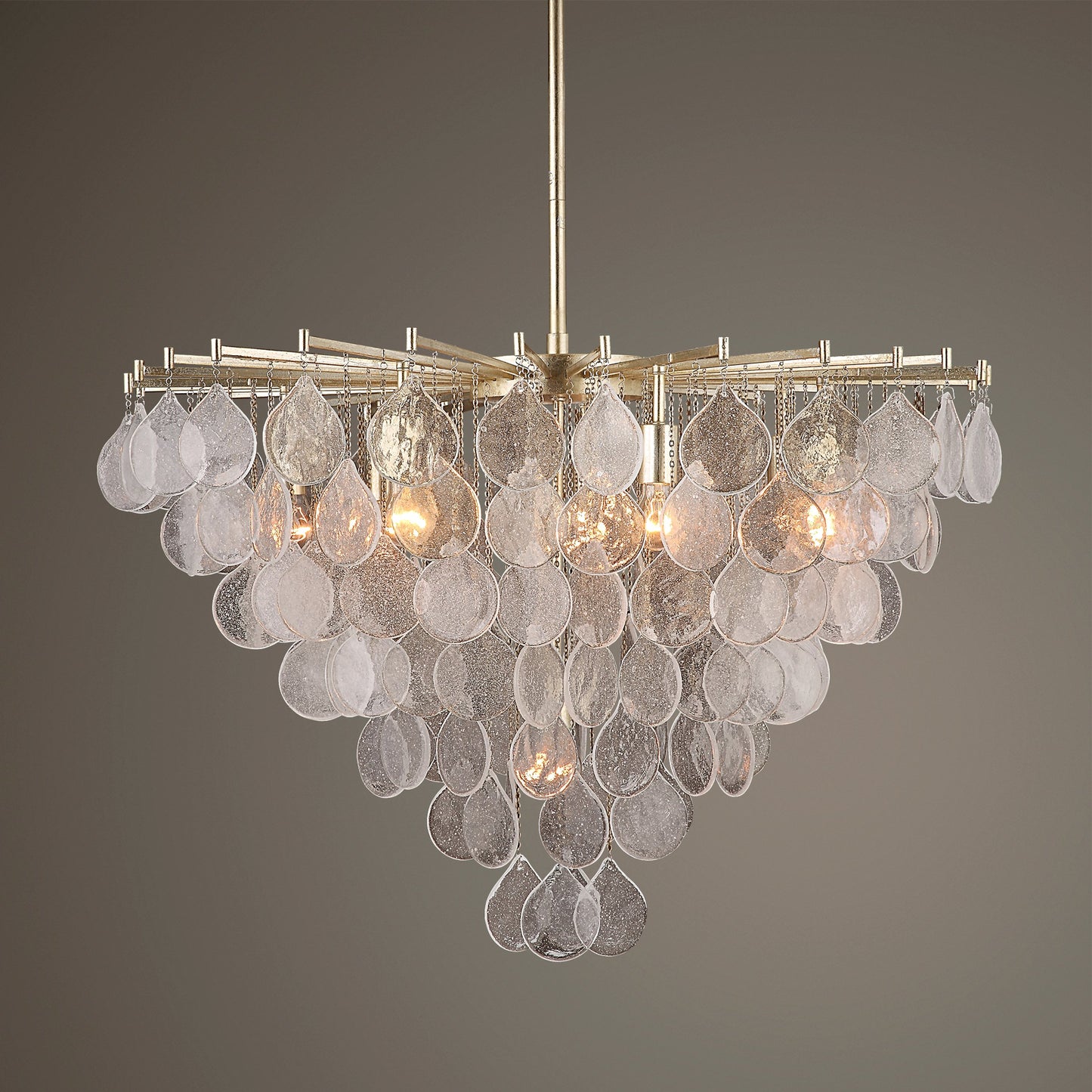 003 SI-1981276 | Lifestyle | Goccia 8 Light Pendant by Uttermost in antique silver leaf. Made from steel, glass in a modern style.