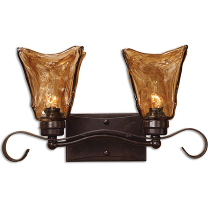 Vetraio Vanity Strip by Uttermost in bronze. Made from metal, brass, glass in a rustic style.
