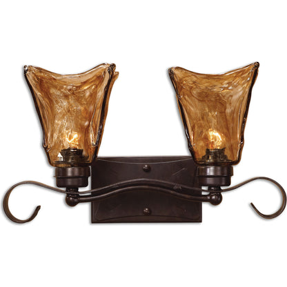 Vetraio Vanity Strip by Uttermost in bronze. Made from metal, brass, glass in a rustic style.