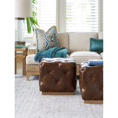 Auburn Cubed Ottoman by Tommy Bahama Home in natural. Made from unique in a modern style.