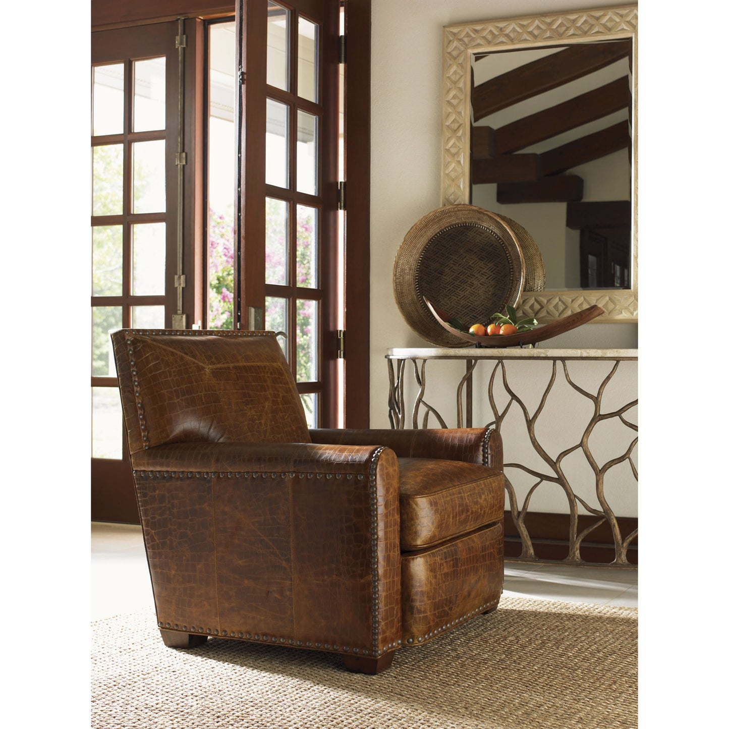 002 SR-836487 | Lifestyle | Stirling Park Leather Chair by Tommy Bahama Home in brown. Made from unique in a rustic style.