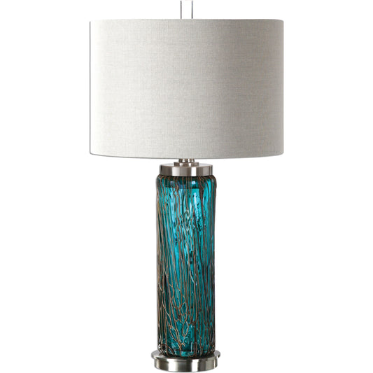 Almanzora Lamp by Uttermost in blue. Made from glass, metal, fabric in a modern style.