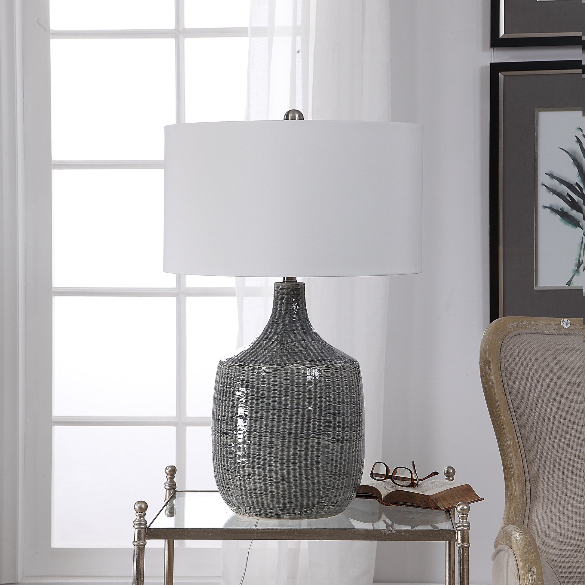 Felipe Table Lamp by Uttermost in light gray. Made from ceramic, iron, fabric in a eclectic & global style.