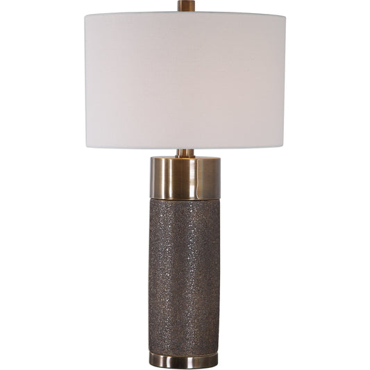 Brannock Table Lamp by Uttermost in bronze. Made from iron, ceramic, fabric in a transitional style.