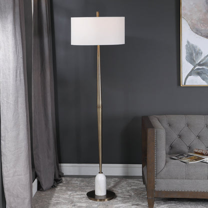 Minette Floor Lamp by Uttermost in antique brass. Made from steel, marble, fabric in a modern style.