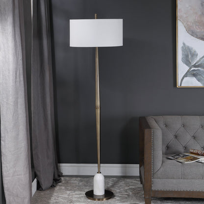 Minette Floor Lamp by Uttermost in antique brass. Made from steel, marble, fabric in a modern style.