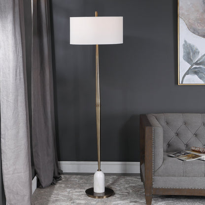 Minette Floor Lamp by Uttermost in antique brass. Made from steel, marble, fabric in a modern style.