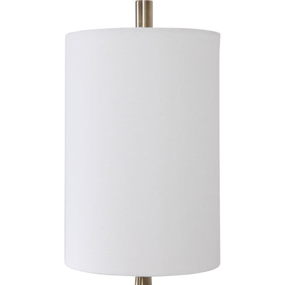 Minette Buffet Lamp by Uttermost in antique brass. Made from steel, marble, fabric in a modern style.