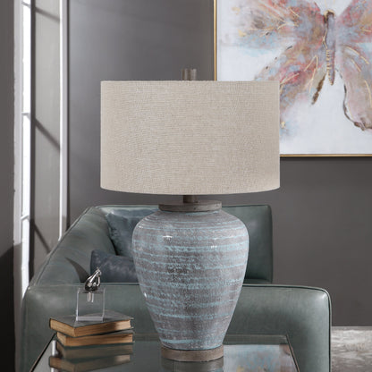 Pelia Table Lamp by Uttermost in aqua. Made from ceramic, resin, fabric in a coastal style.
