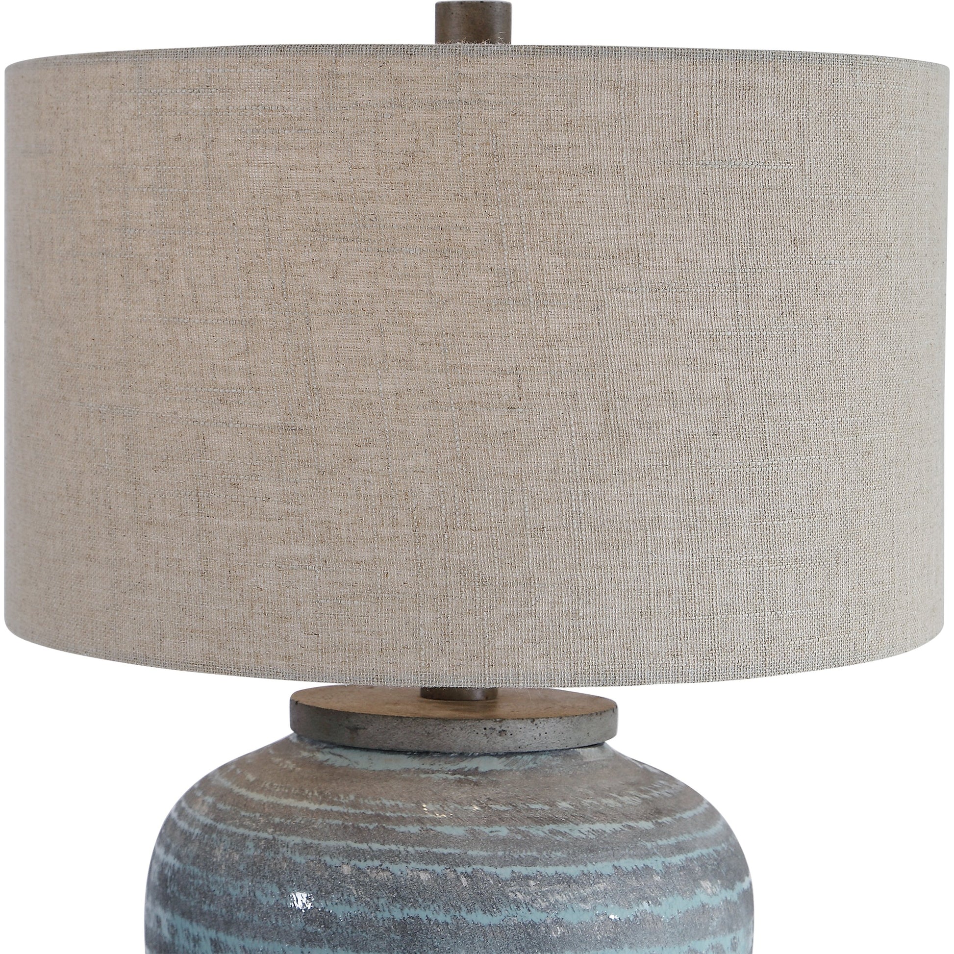 Pelia Table Lamp by Uttermost in aqua. Made from ceramic, resin, fabric in a coastal style.