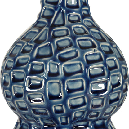 Holloway Table Lamp by Uttermost in blue. Made from ceramic, iron, fabric in a transitional style.