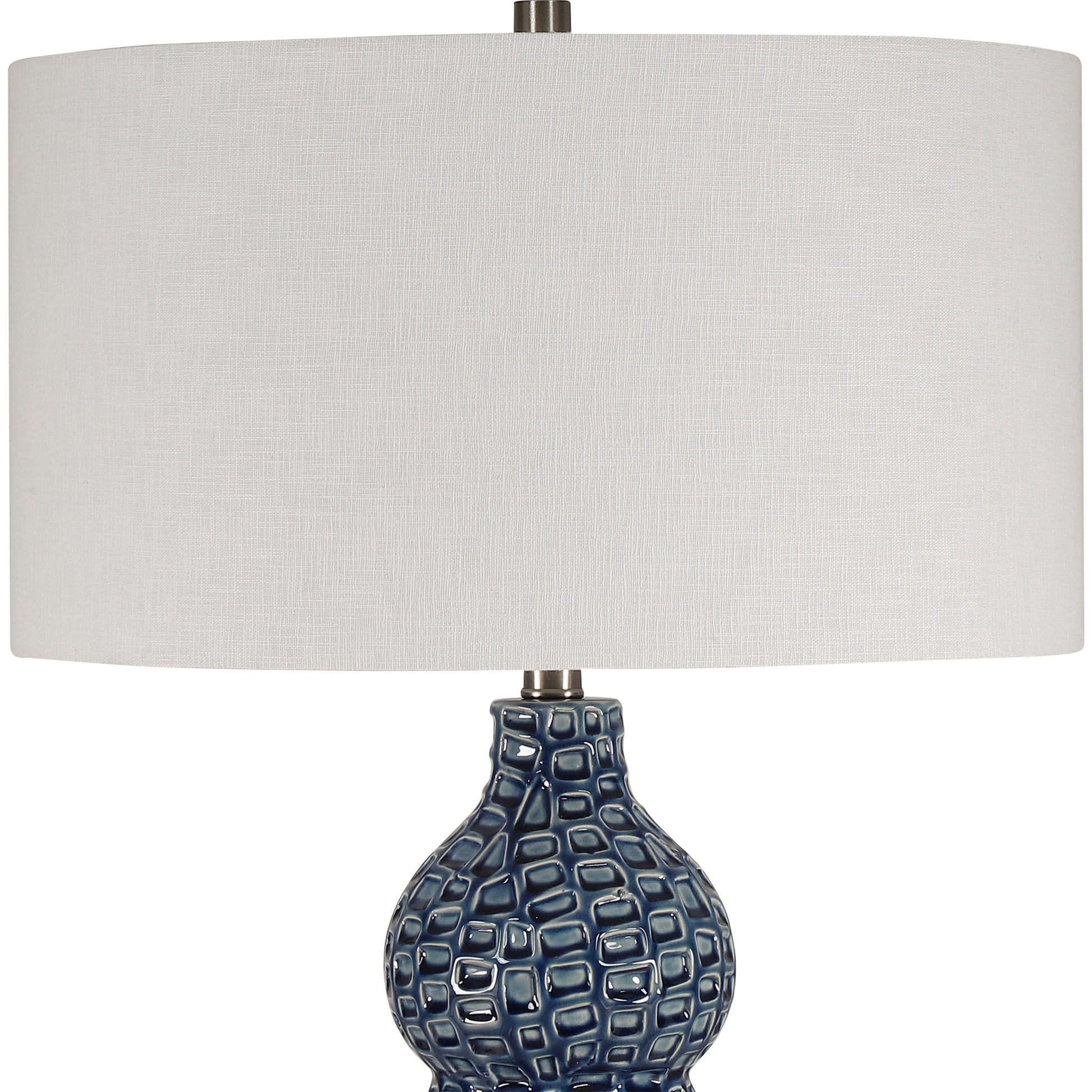 Holloway Table Lamp by Uttermost in blue. Made from ceramic, iron, fabric in a transitional style.