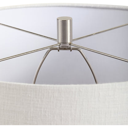 Holloway Table Lamp by Uttermost in blue. Made from ceramic, iron, fabric in a transitional style.