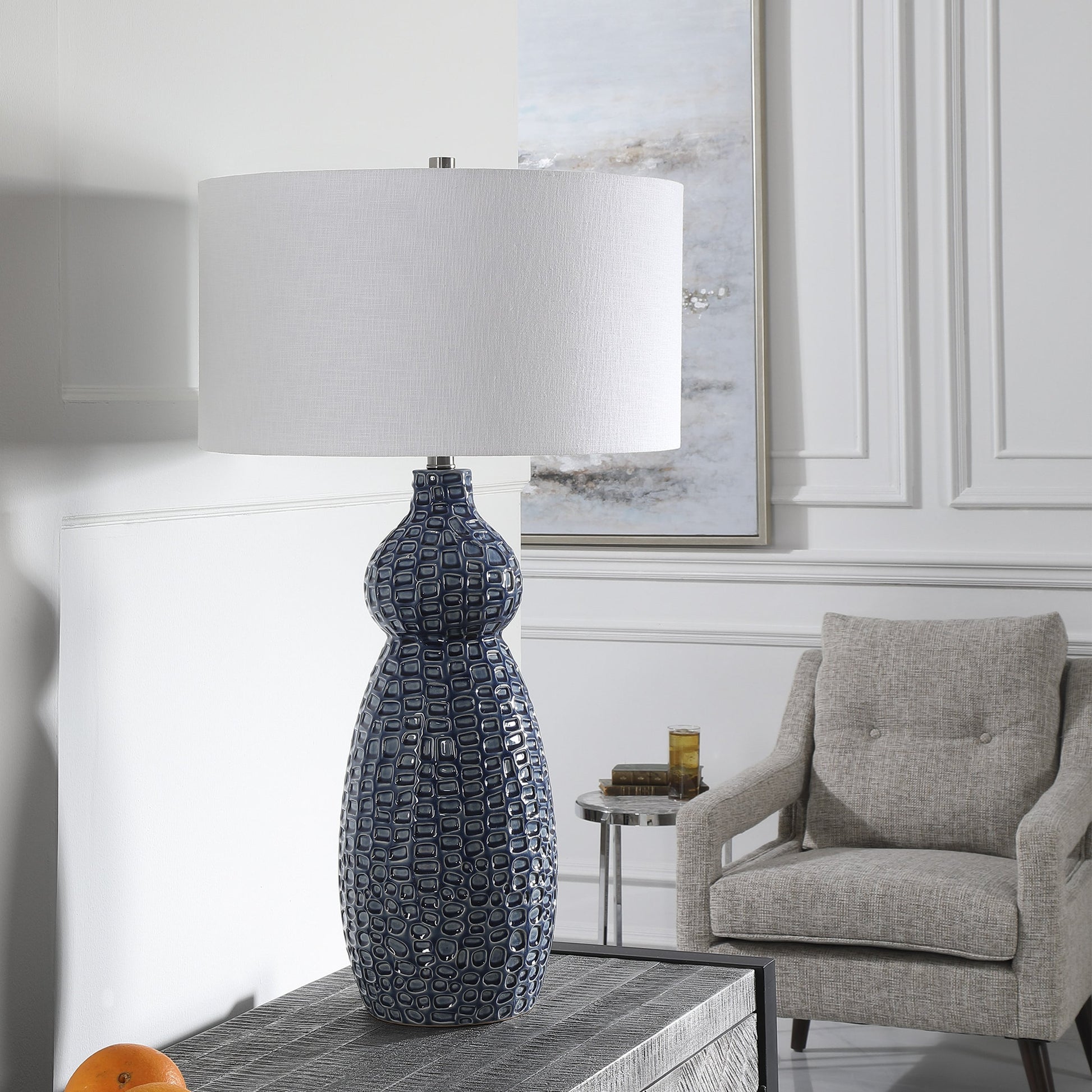 Holloway Table Lamp by Uttermost in blue. Made from ceramic, iron, fabric in a transitional style.