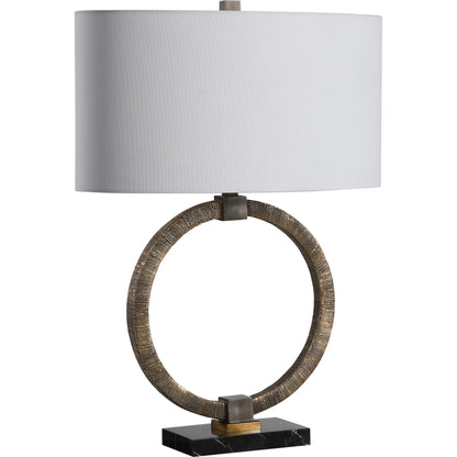 Relic Aged Table Lamp by Uttermost in gold. Made from resin, marble, iron, fabric in a eclectic & global style.