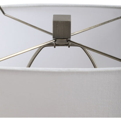 Relic Aged Table Lamp by Uttermost in gold. Made from resin, marble, iron, fabric in a eclectic & global style.