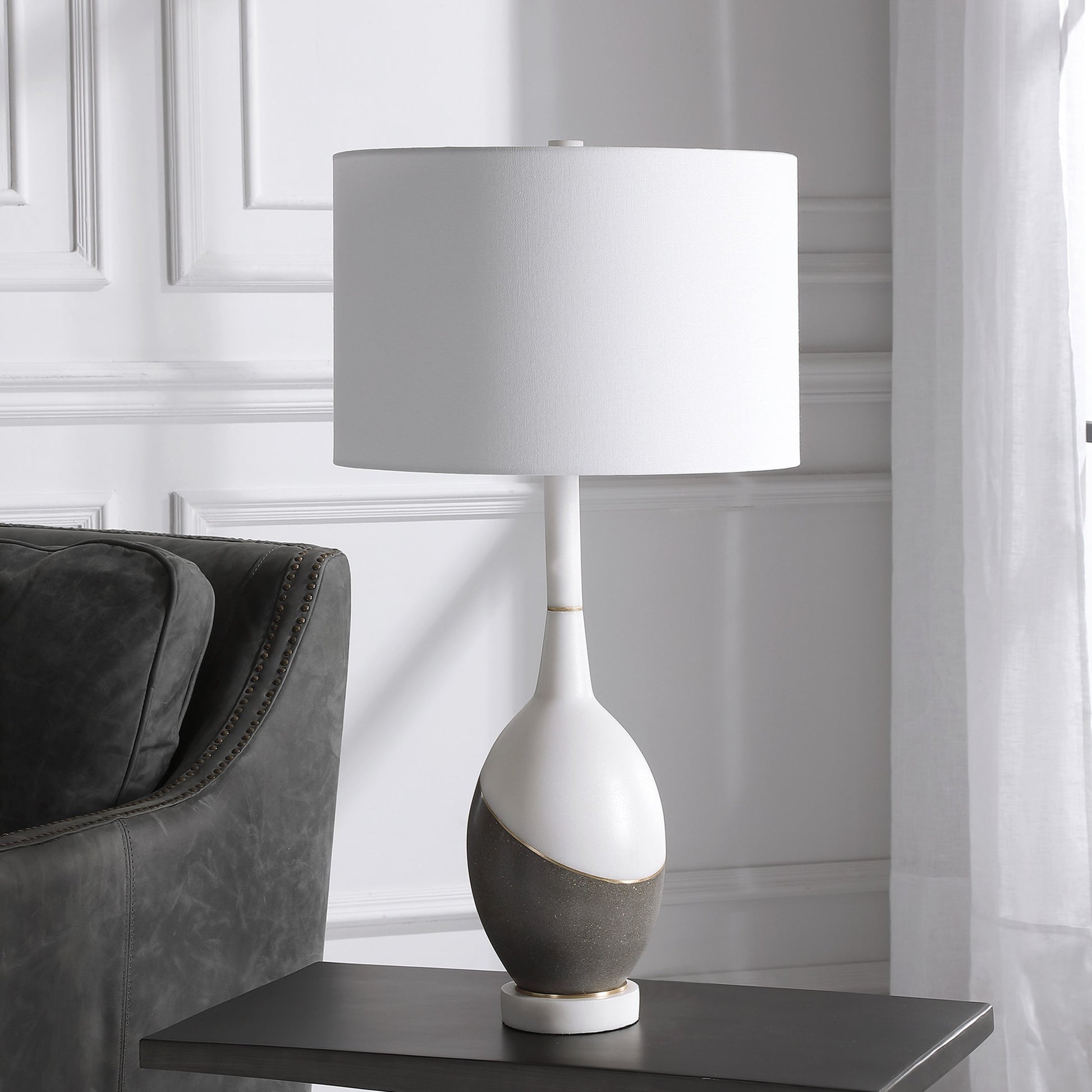 Tanali Table Lamp by Uttermost. Made from copper, concrete, resin, iron, fabric in a modern style.