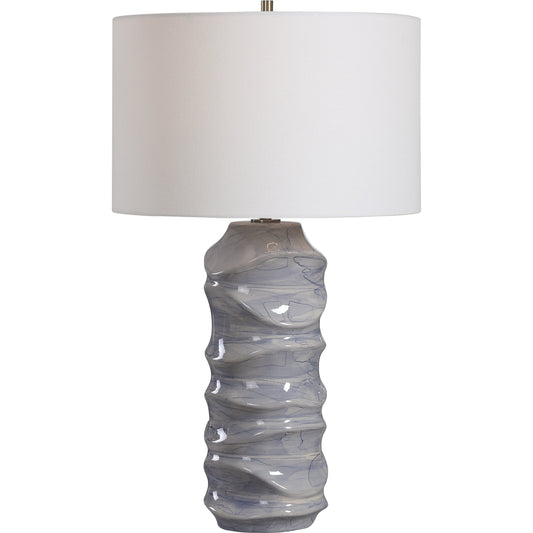 Waves Table Lamp by Uttermost in blue. Made from ceramic, iron, fabric in a modern style.