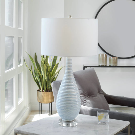 Clariot Table Lamp by Uttermost in soft blue, white. Made from iron, crystal, fabric, ceramic in a transitional style.
