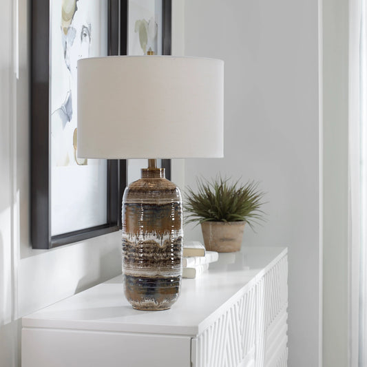 Roan Artisian Table Lamp by Uttermost in brass. Made from metal, ceramic, fabric in a modern style.