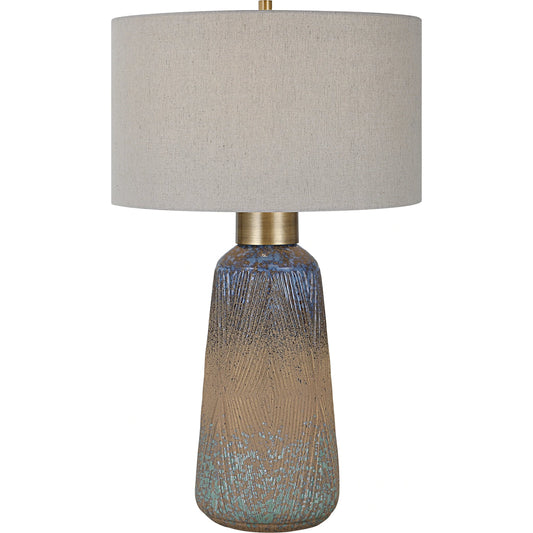 Western Sky Table Lamp by Uttermost in brass. Made from steel, ceramic, fabric in a modern style.