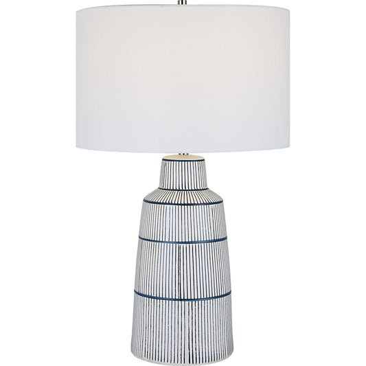 Breton Table Lamp by Uttermost in navy blue. Made from steel, ceramic, fabric in a coastal style.