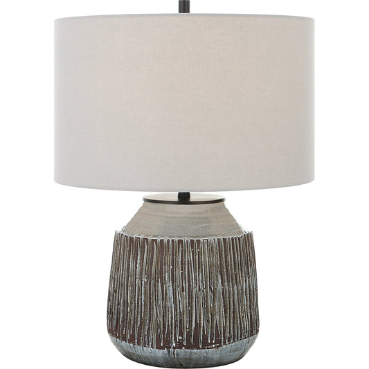 Neolithic Table Lamp by Uttermost in blue-gray. Made from steel, ceramic, fabric in a modern style.