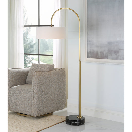 Huxford Floor Lamp by Uttermost in antique brushed brass. Made from iron, marble, fabric in a modern style.