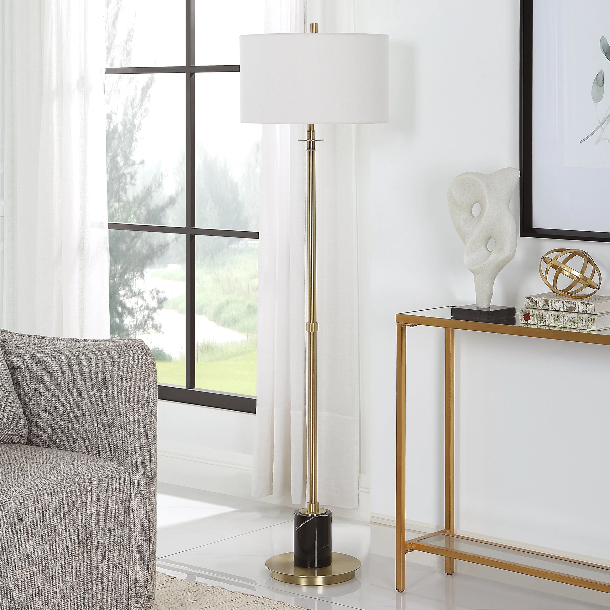 Guard Floor Lamp by Uttermost in brass. Made from iron, marble, fabric in a modern style.