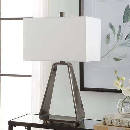 Halo Table Lamp by Uttermost in antique nickel. Made from steel, fabric in a modern style.