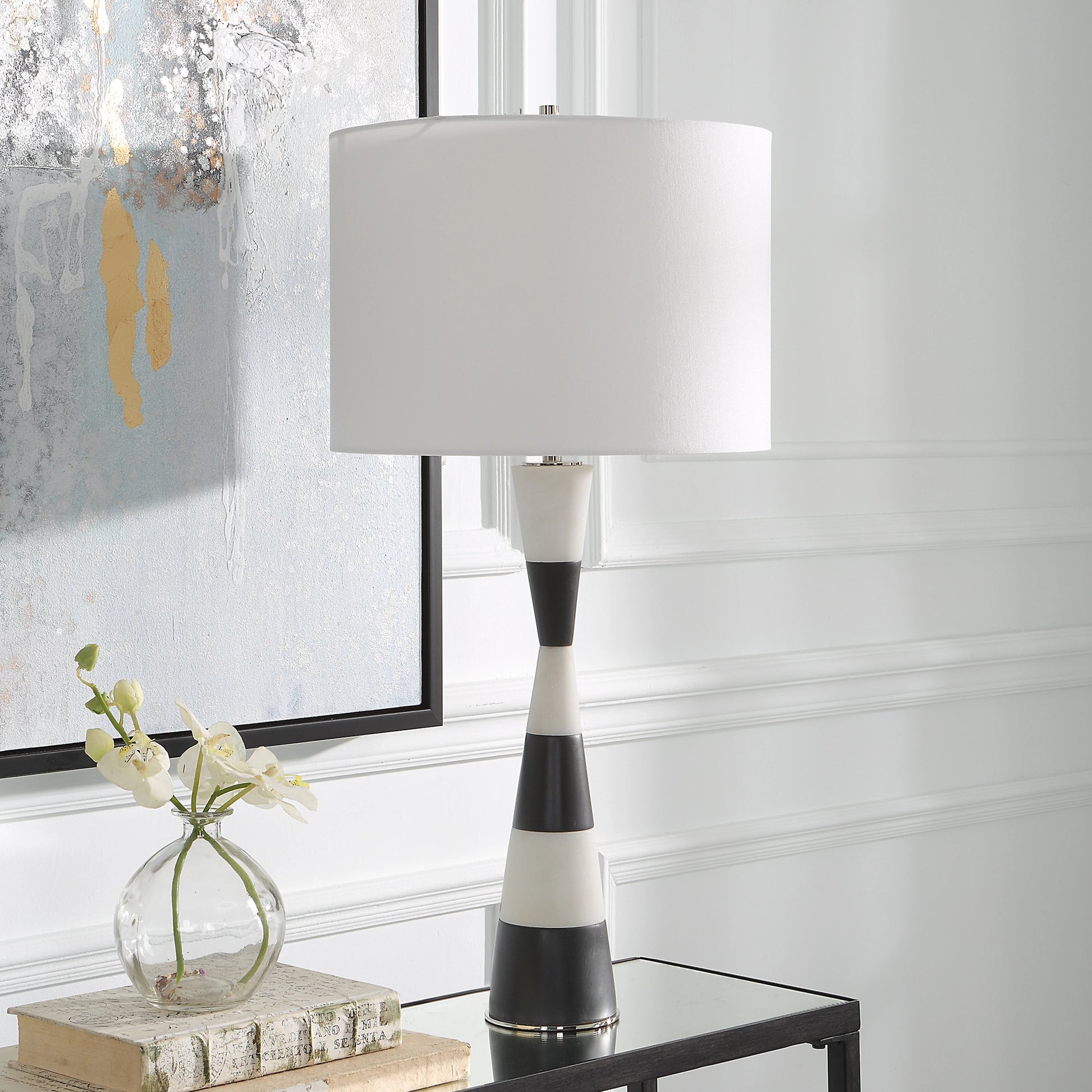 Bandeau Banded Table Lamp by Uttermost in black, white. Made from rice stone, iron, linen, resin in a modern style.
