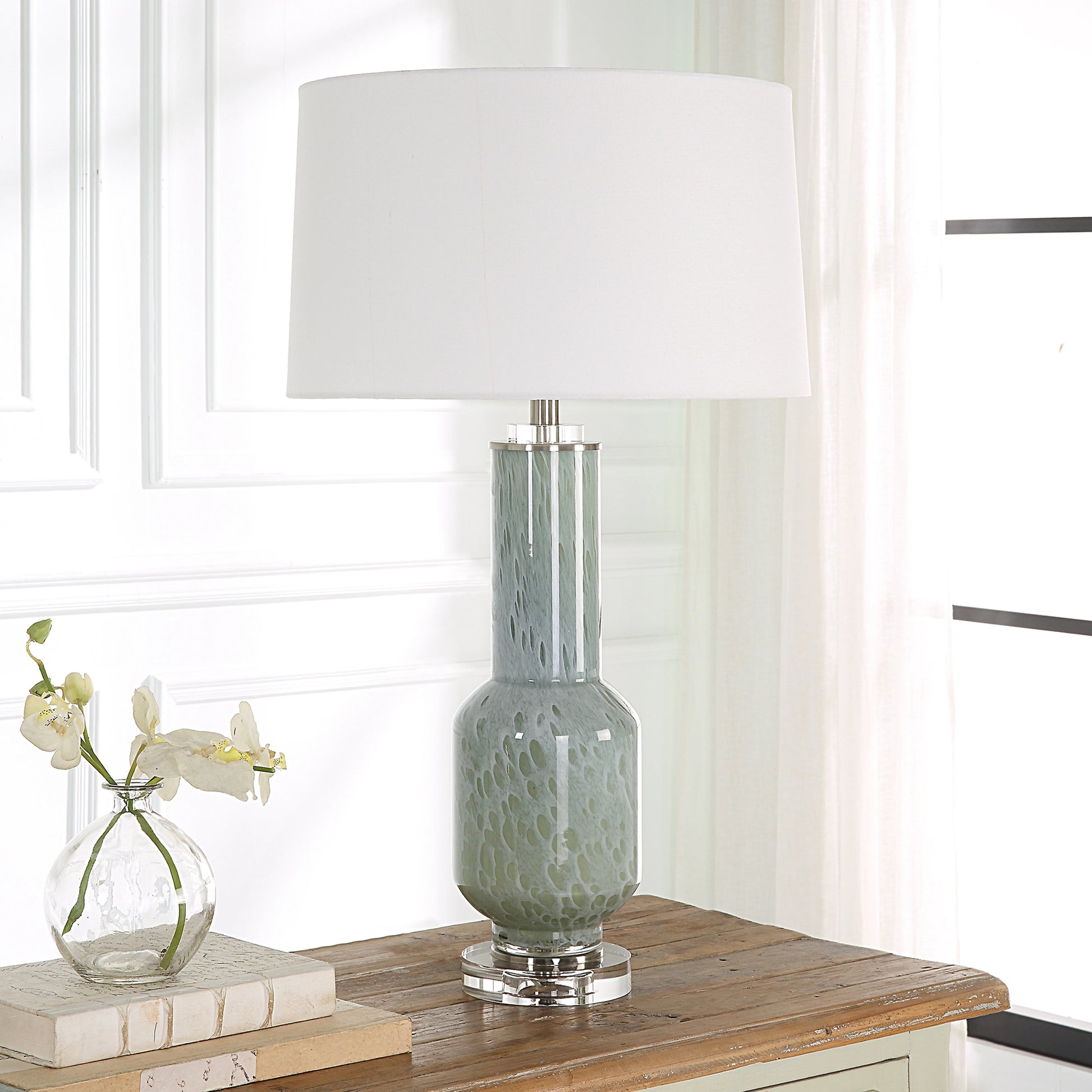 Imperia Table Lamp by Uttermost in aqua gray. Made from crystal, glass, iron, fabric in a modern style.