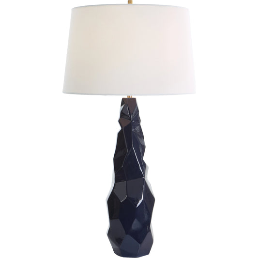 Kavos Table Lamp by Uttermost in navy blue. Made from ceramic, iron, fabric in a modern style.