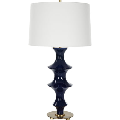 Coil Sculpted Table Lamp by Uttermost in cobalt. Made from ceramic, iron, fabric in a modern style.