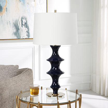 Coil Sculpted Table Lamp by Uttermost in cobalt. Made from ceramic, iron, fabric in a modern style.