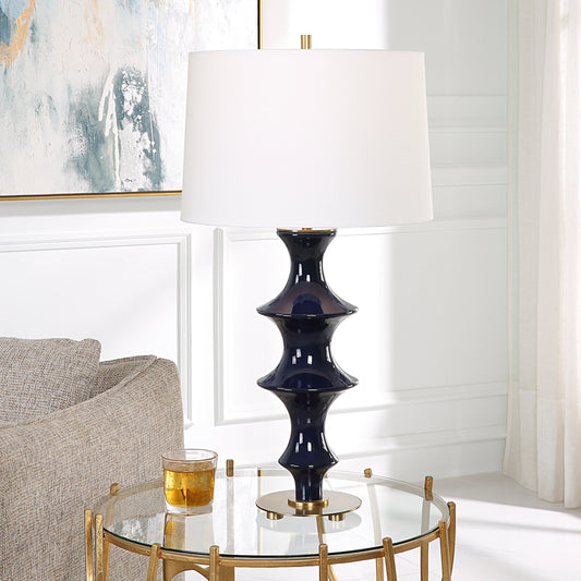 Coil Sculpted Table Lamp by Uttermost in cobalt. Made from ceramic, iron, fabric in a modern style.
