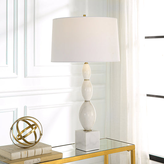 Regalia Table Lamp by Uttermost in white. Made from marble, iron, fabric in a modern style.