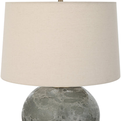 Lunia Table Lamp by Uttermost in smoky gray. Made from iron, glass, linen in a modern style.